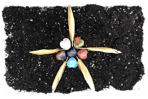 Star image from feathers and heart stones